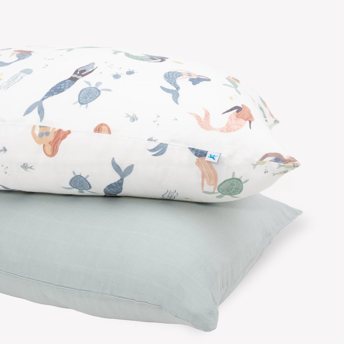 Little Unicorn Mermaid Party pillowcase close-up shows ultra-soft muslin for cozy nights