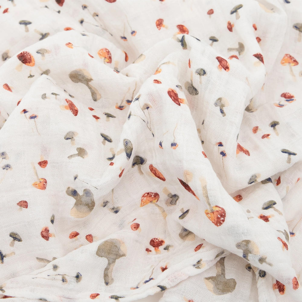 Little Unicorn mushrooms swaddle security promotes calm daytime naps and secure swaddling.