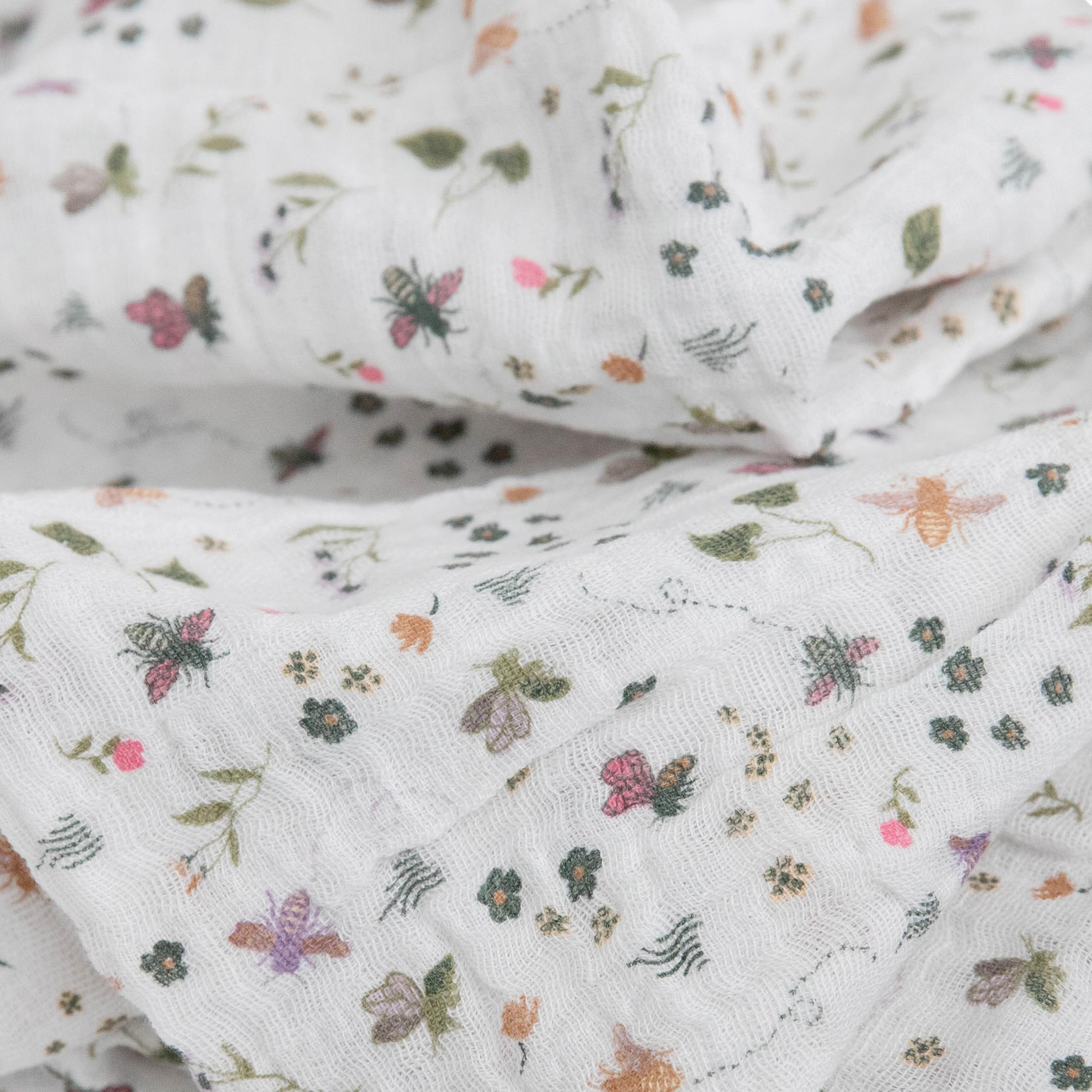 Little Unicorn muslin texture closeup – soft cotton muslin ideal for delicate newborn skin.