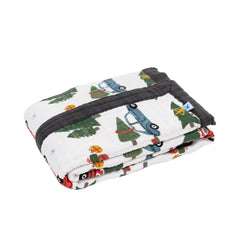 Little Unicorn newborn receiving quilt 4-layer muslin design ensures breathable warmth during naps.