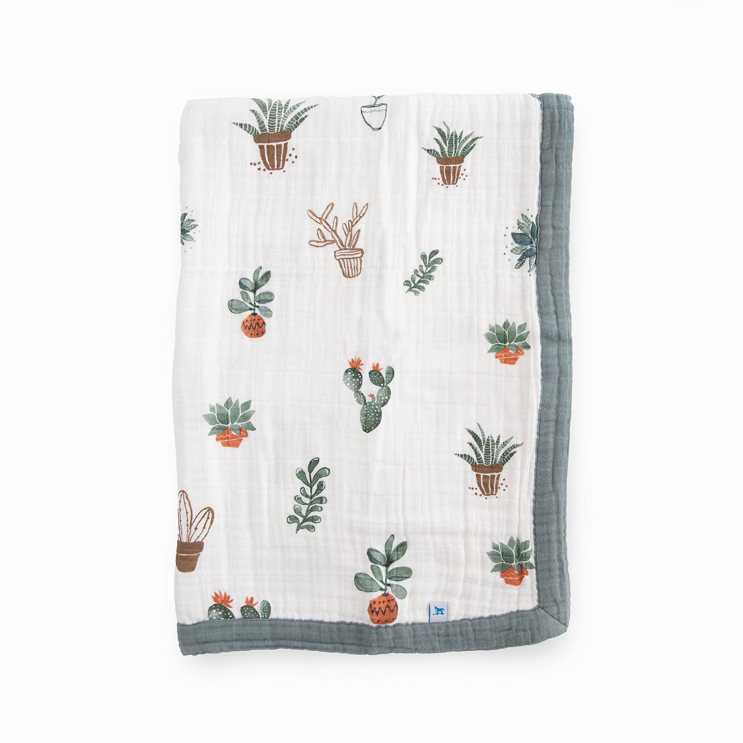 Little Unicorn newborn receiving quilt four-layer muslin close-up for soft cuddle readiness.