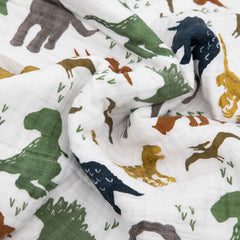 Stitched detail on Little Unicorn Dino Friends quilt showing durable bias binding