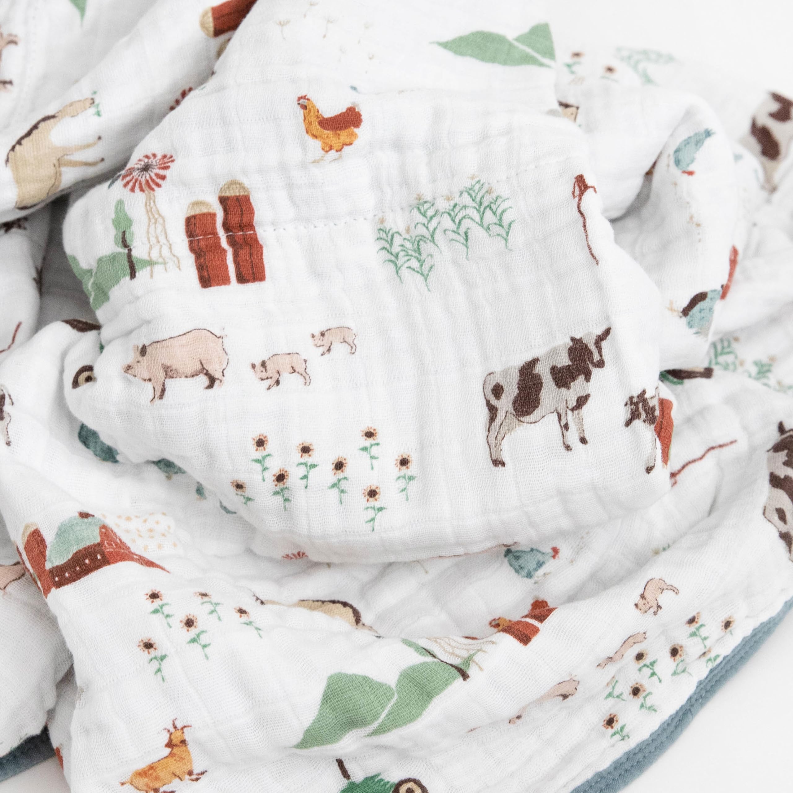 Little Unicorn quilt farmyard on the go with lightweight design for travel snuggles