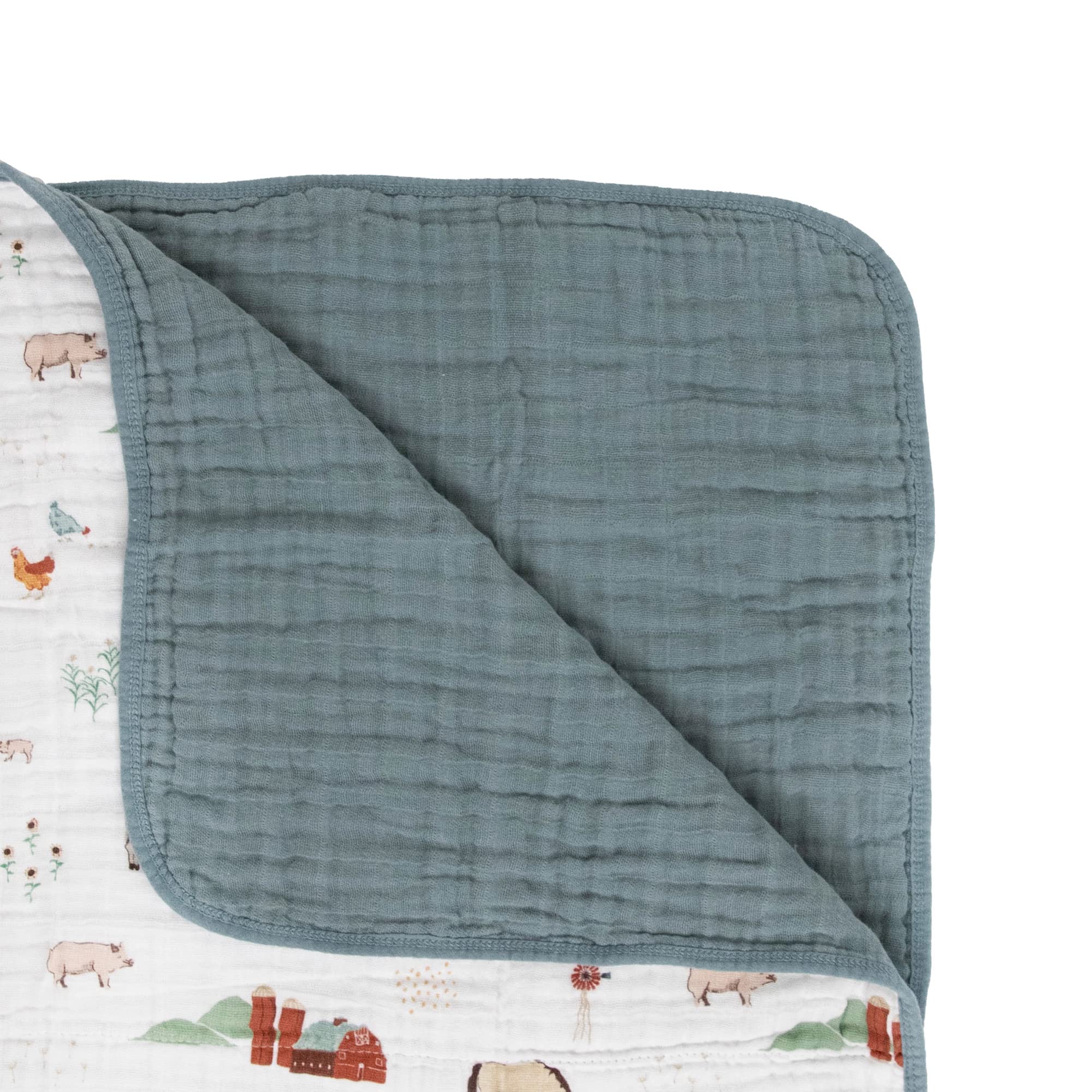Little Unicorn quilt farmyard snuggle time scene highlights ultra-soft muslin for cozy mornings