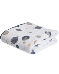 Little Unicorn Original Quilt folded travel compact demonstrates easy packing for on-the-go days.