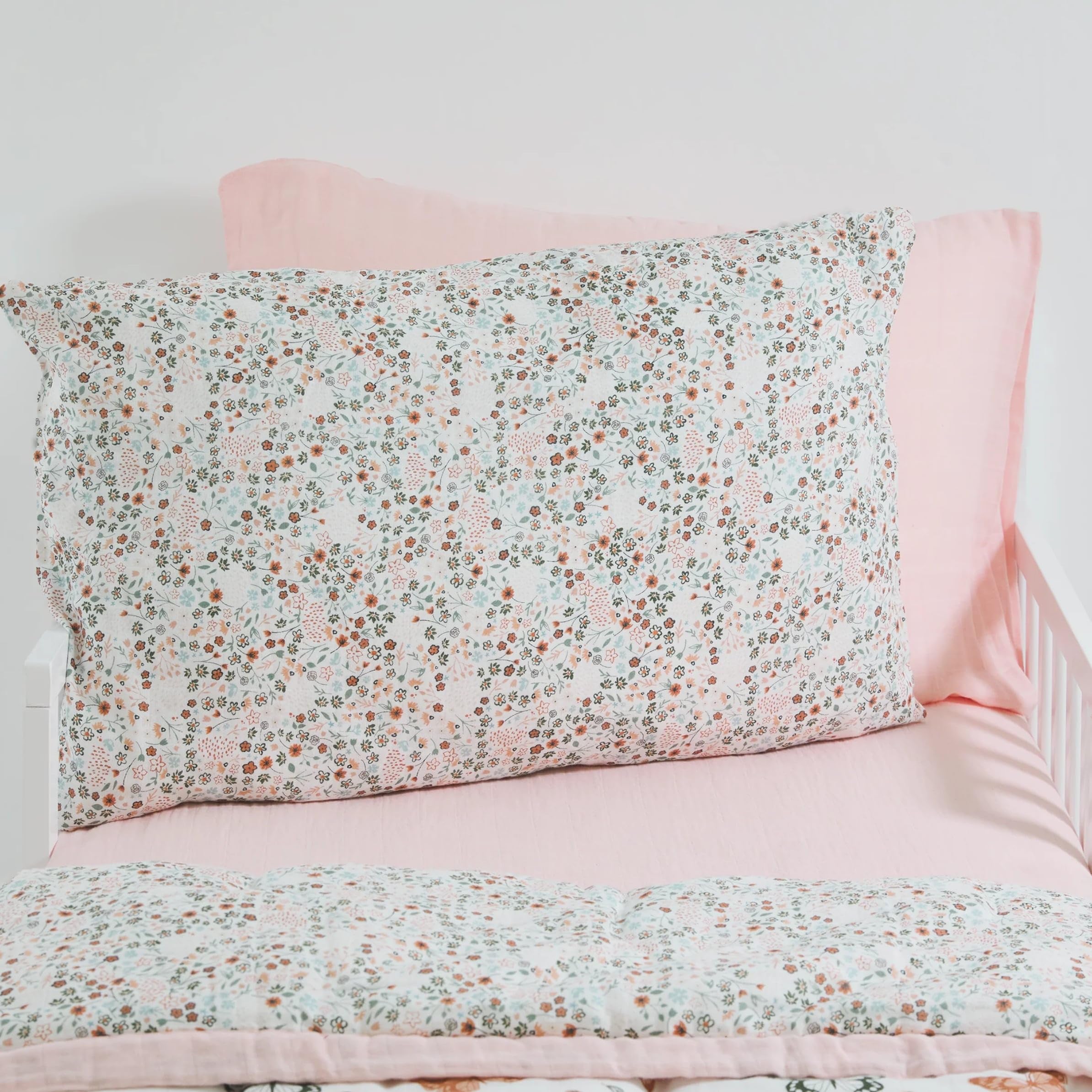 Little Unicorn pillowcase envelope closure closeup demonstrates secure fit for standard pillow
