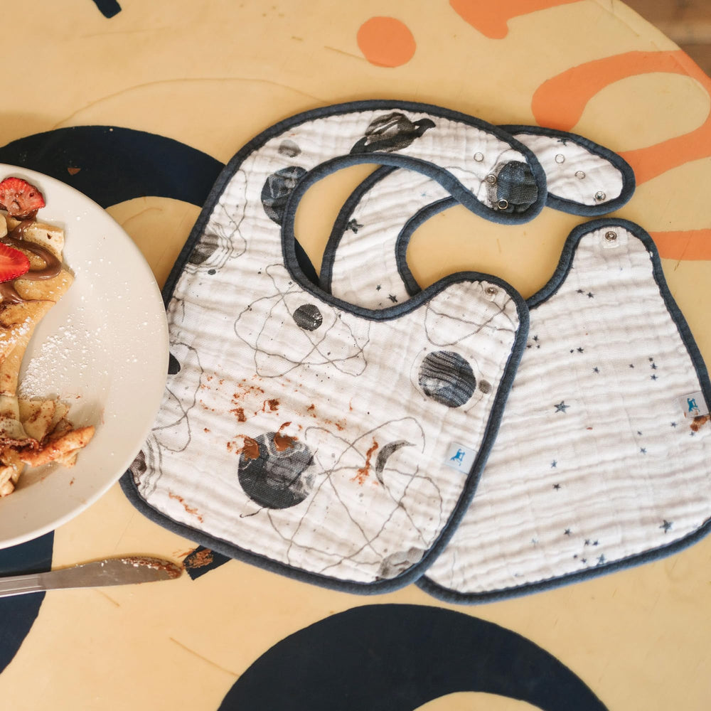 Little Unicorn Premium Classic Bib 3-Pack in-use mealtime setup for mess-prone feeding