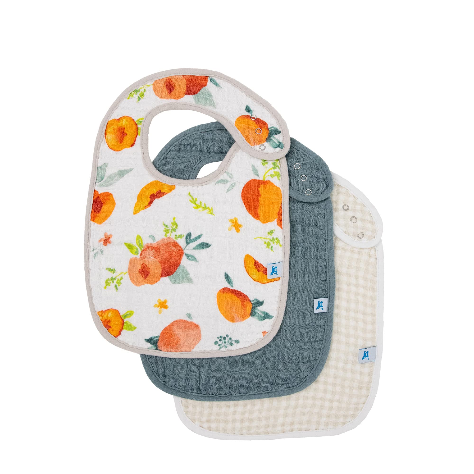 Little Unicorn Premium Classic Bib Georgia Peach close-up showing ultra-soft cotton muslin gentle on delicate baby skin
