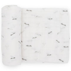 Little Unicorn premium cotton swaddle close-up shows breathable muslin fabric for baby comfort and warmth.
