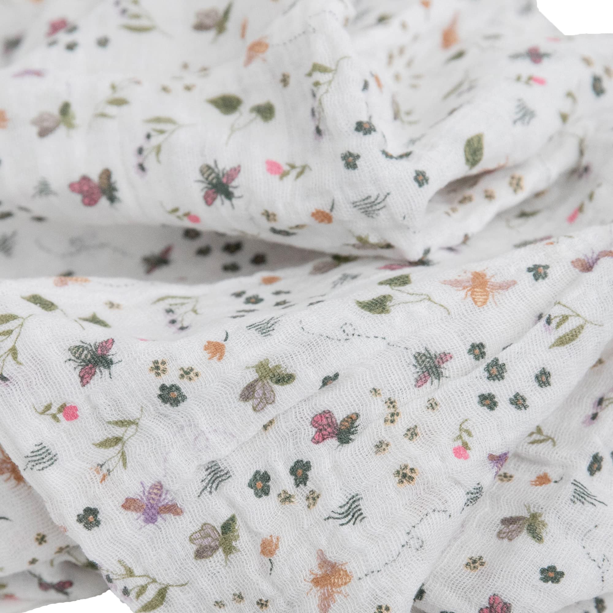 Little Unicorn garden-bees-design swaddle pattern adds playful gender neutral style.