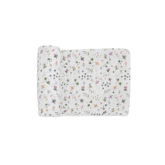 Little Unicorn premium cotton swaddle closeup on soft muslin texture for gentle baby comfort.