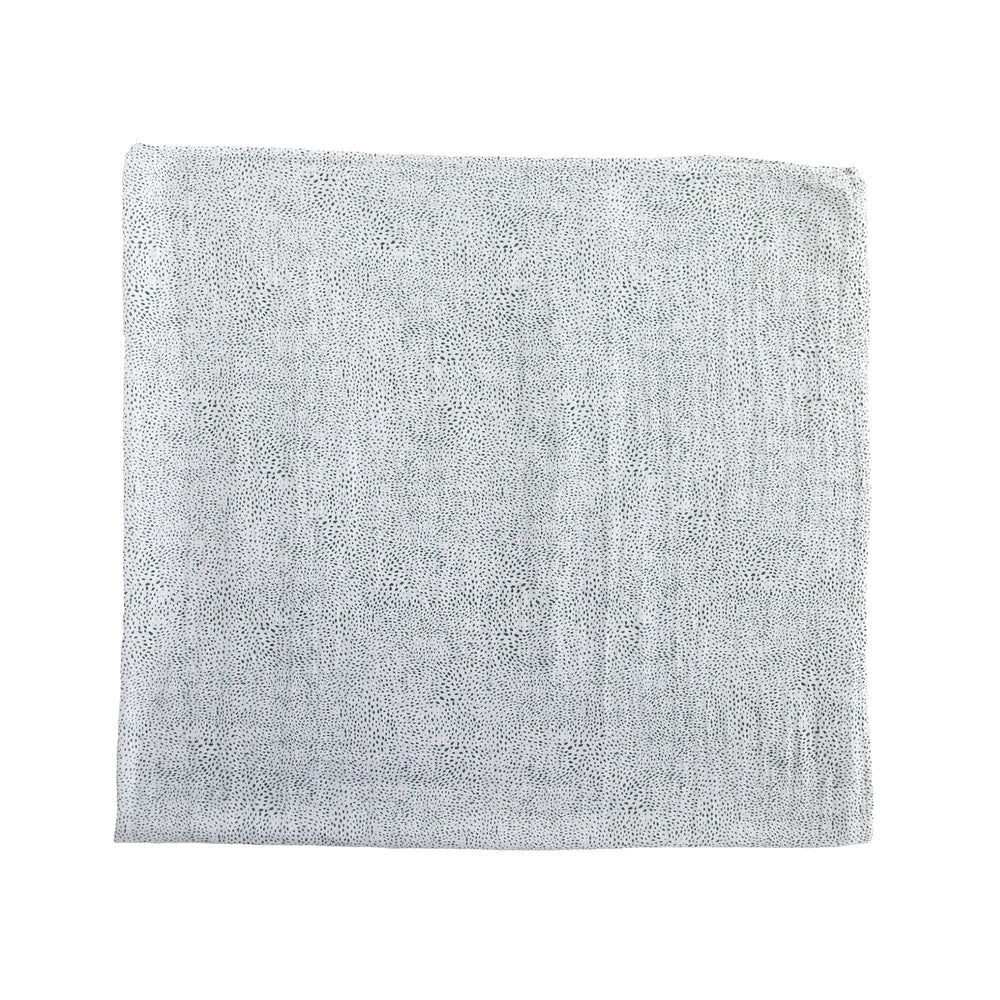 Little Unicorn swaddle nursing scene showing hands-free feeding with breathable fabric.