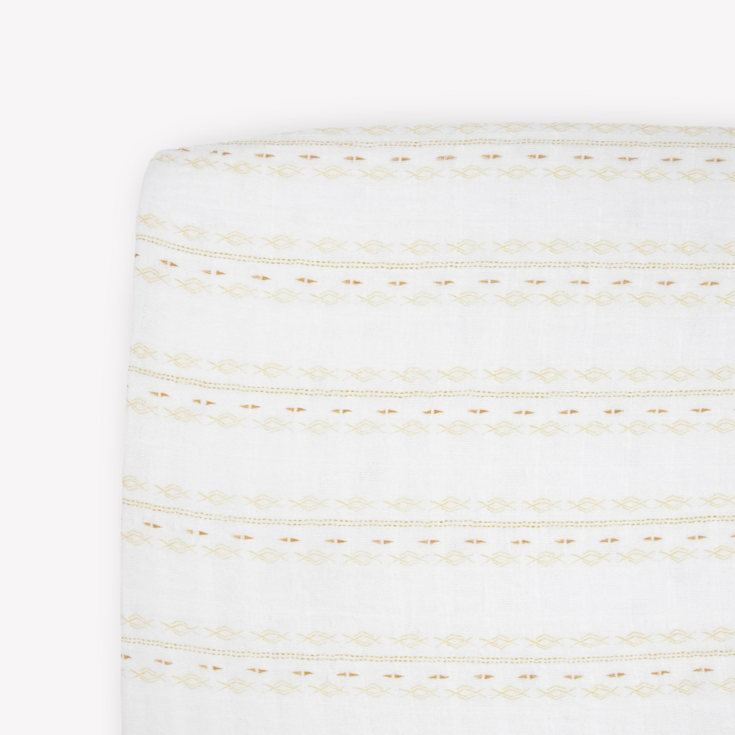 Little Unicorn Premium Crib Sheet fabric texture close-up, showing soft, breathable muslin.