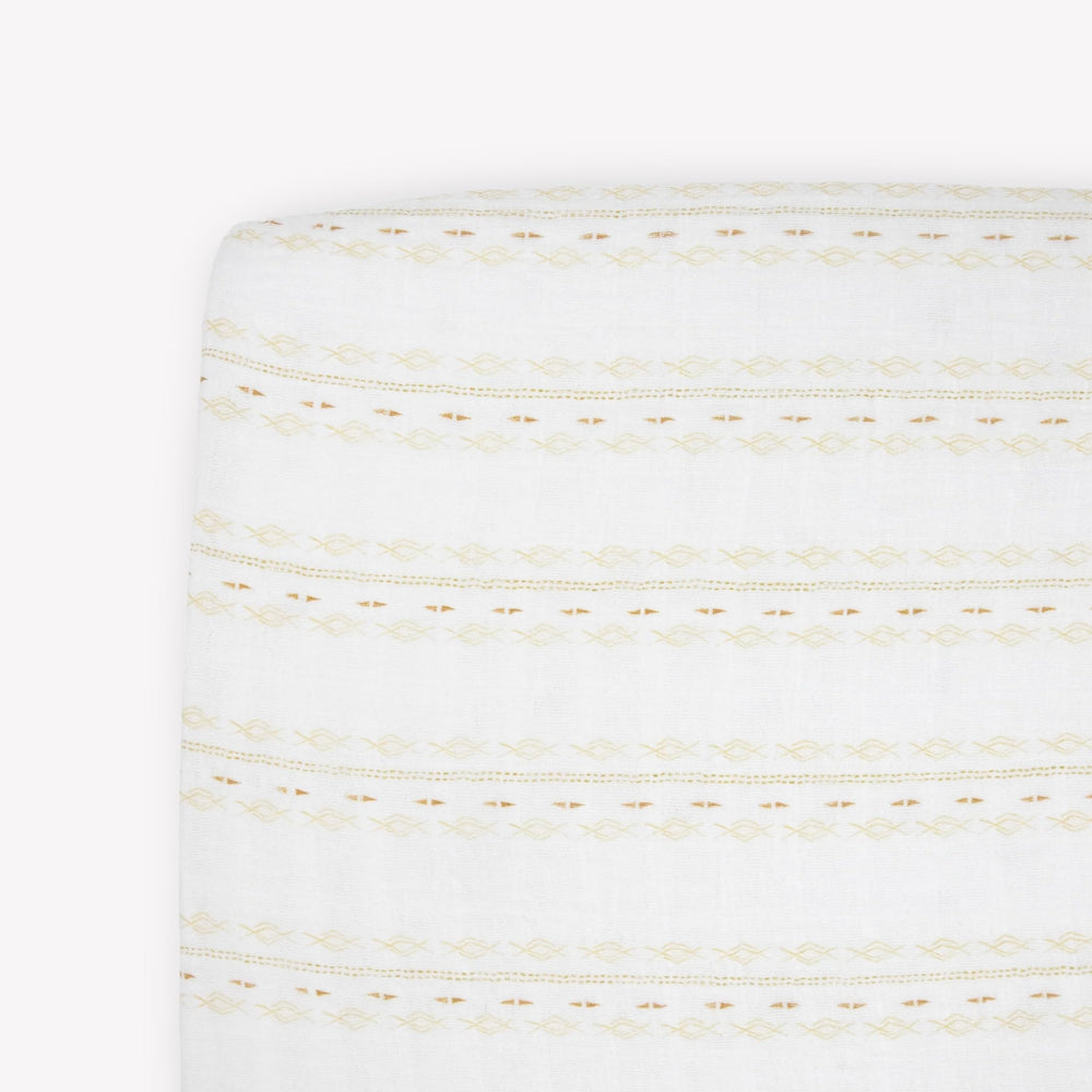 Little Unicorn Premium Crib Sheet fabric texture close-up, showing soft, breathable muslin.