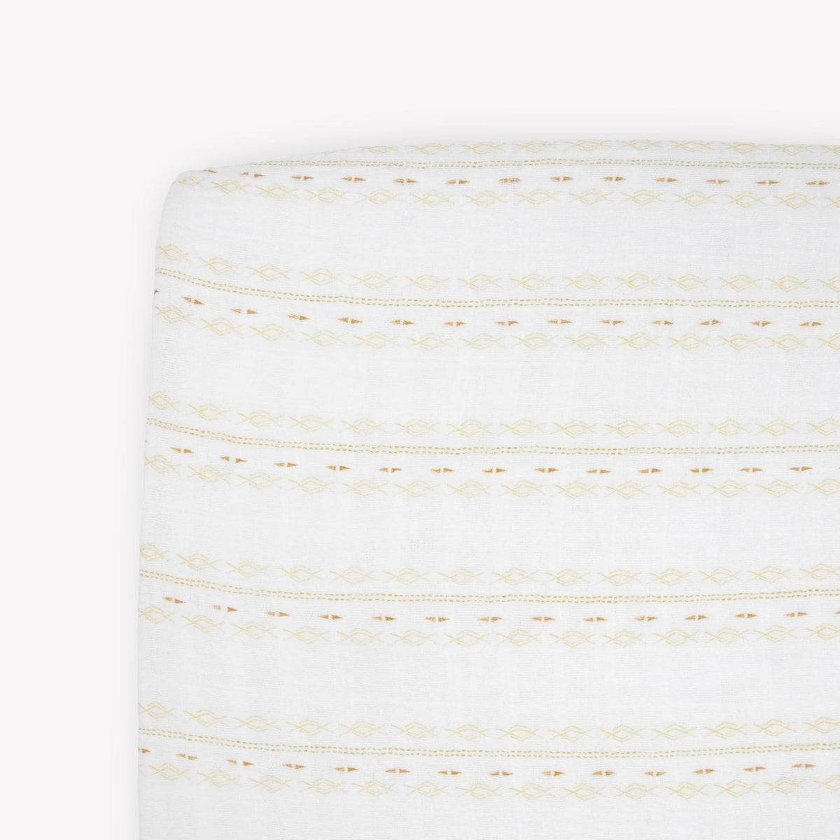 Little Unicorn Premium Crib Sheet fabric texture close-up, showing soft, breathable muslin.
