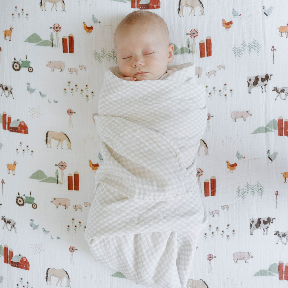 Little Unicorn Premium Crib Sheet on crib mattress demonstrates breathable year-round comfort