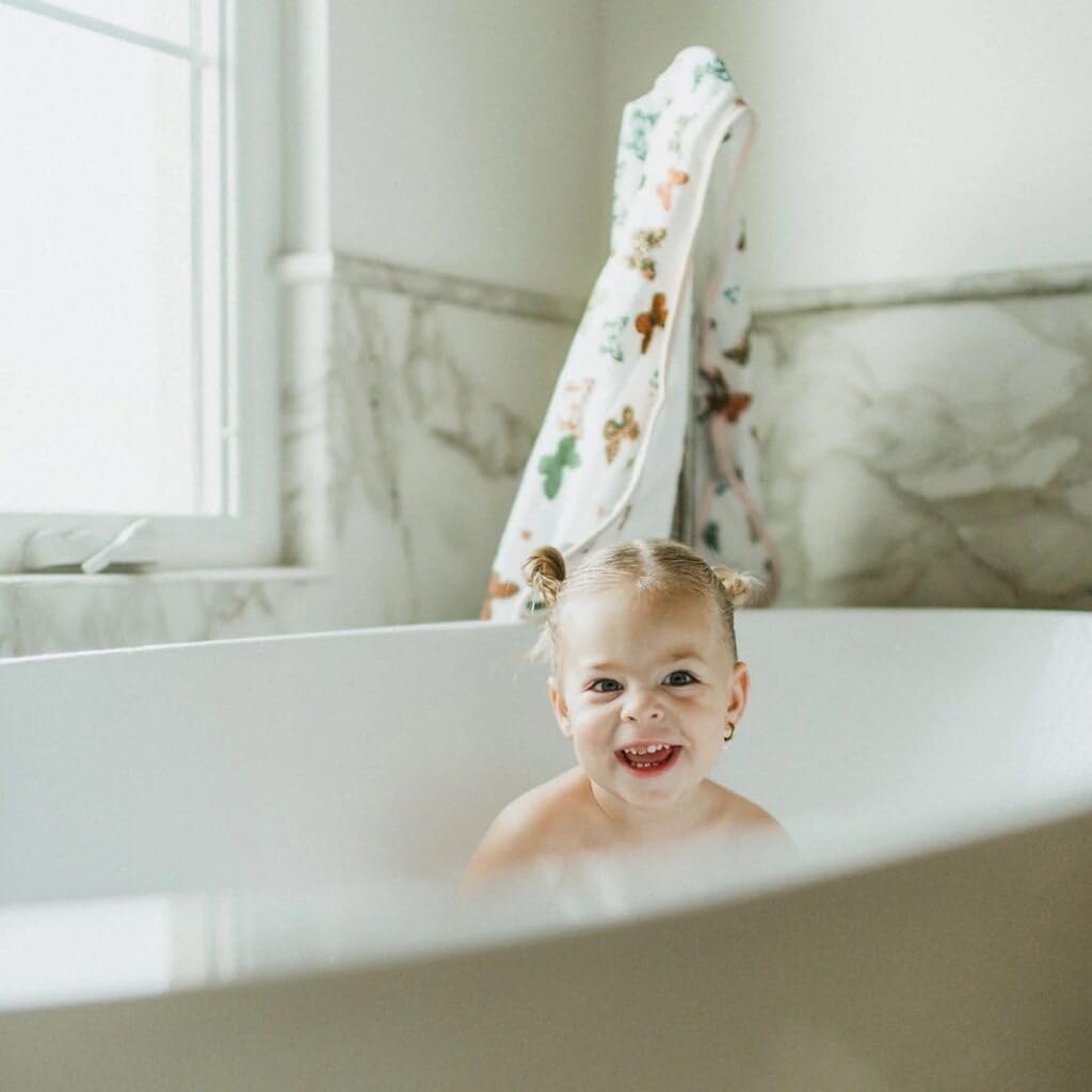 Little Unicorn premium hooded towel butterflies design detail—handpainted aesthetic adds charm.