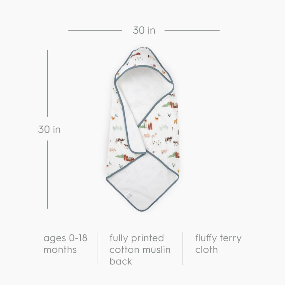Little Unicorn farmyard print image displays playful design for bath time comfort.