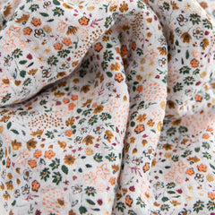 Little Unicorn swaddle set pressed petals design, lightweight blanket ideal for playtime and stroller use.