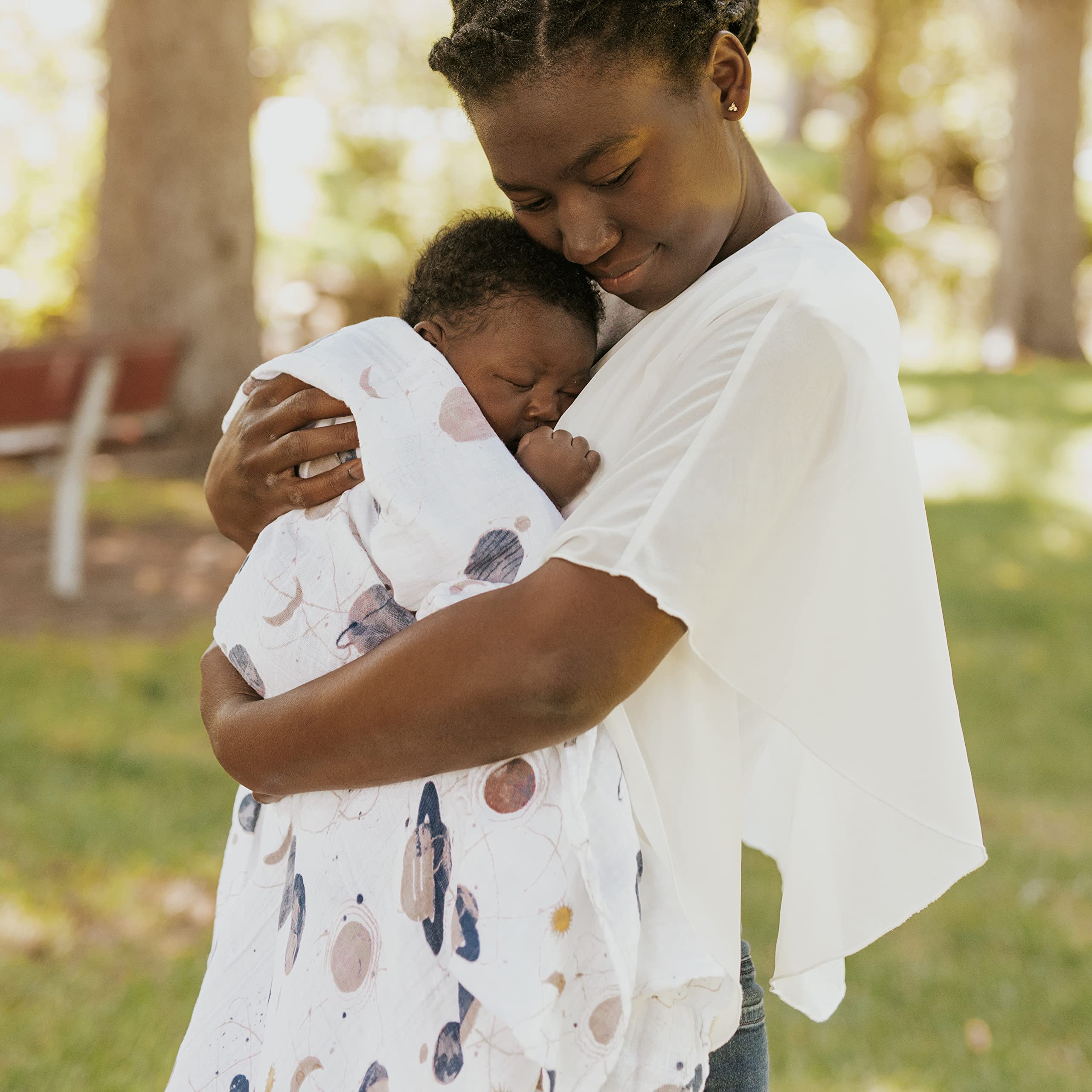 Little Unicorn swaddle Planetary 2 playtime moment showcases breathable comfort during daytime activities.