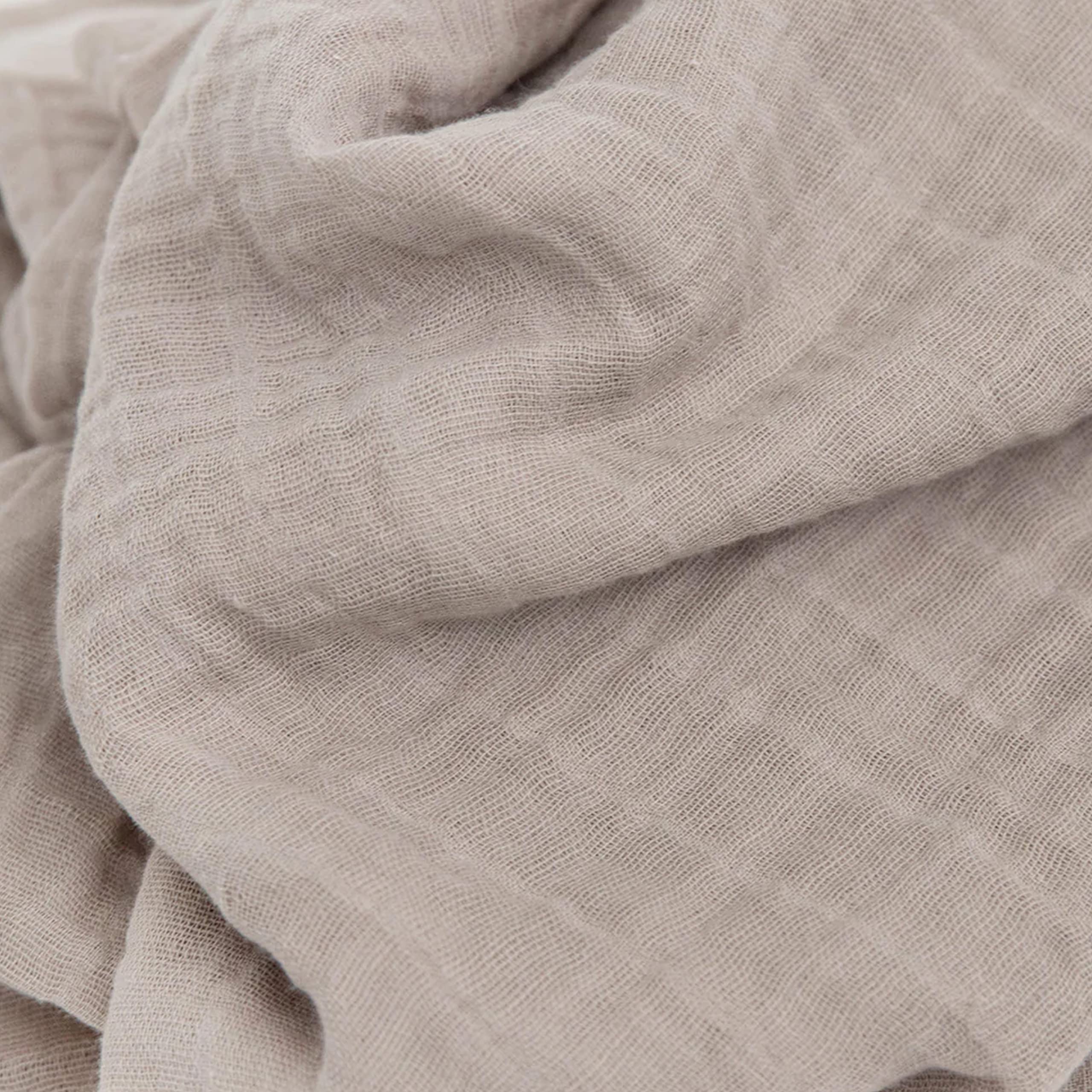 Little Unicorn swaddle Planetary 2 nursing-use shot emphasizes easy, comfortable feeding moments.