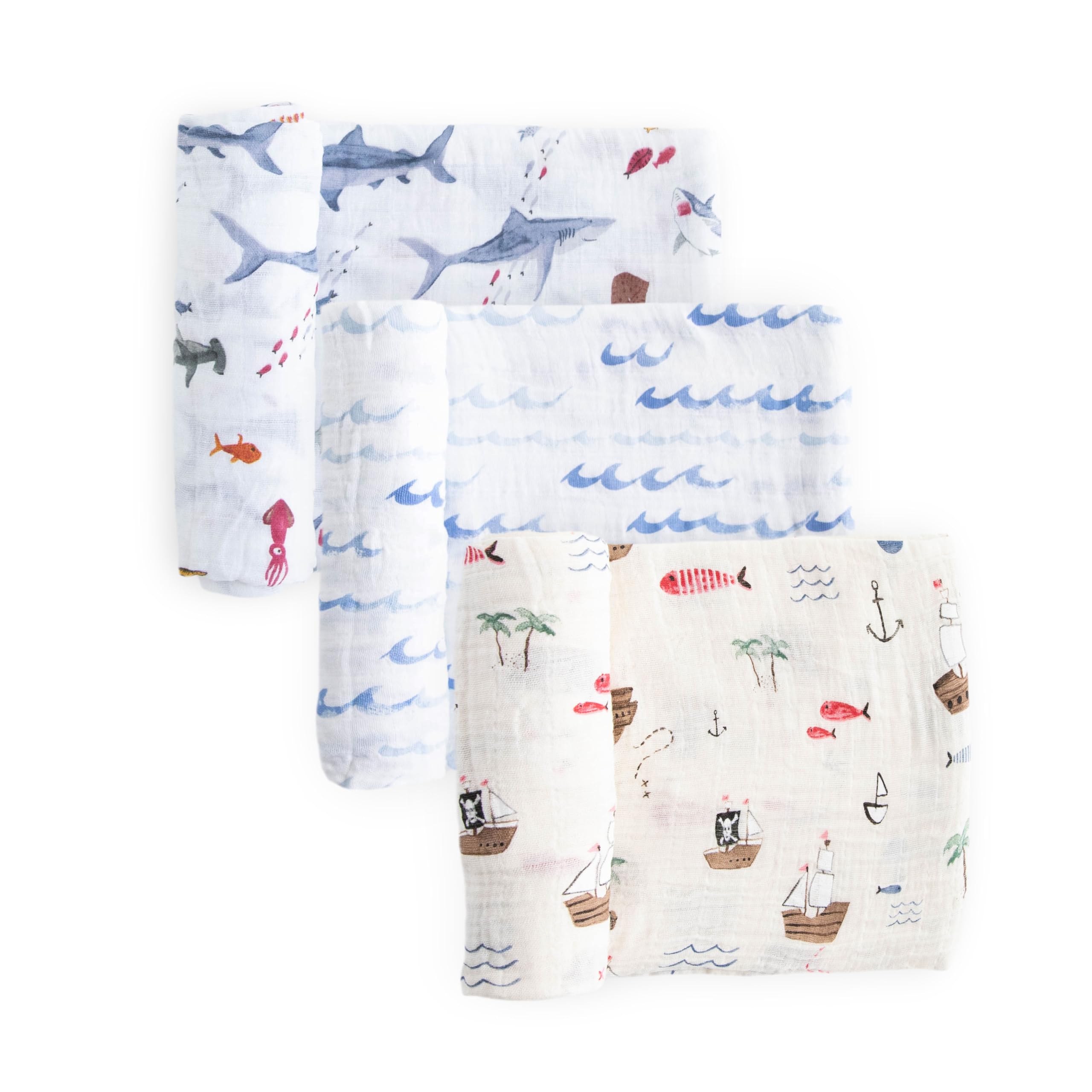 Little Unicorn premium muslin swaddle Shark-2 design offers cozy swaddling and playful style.