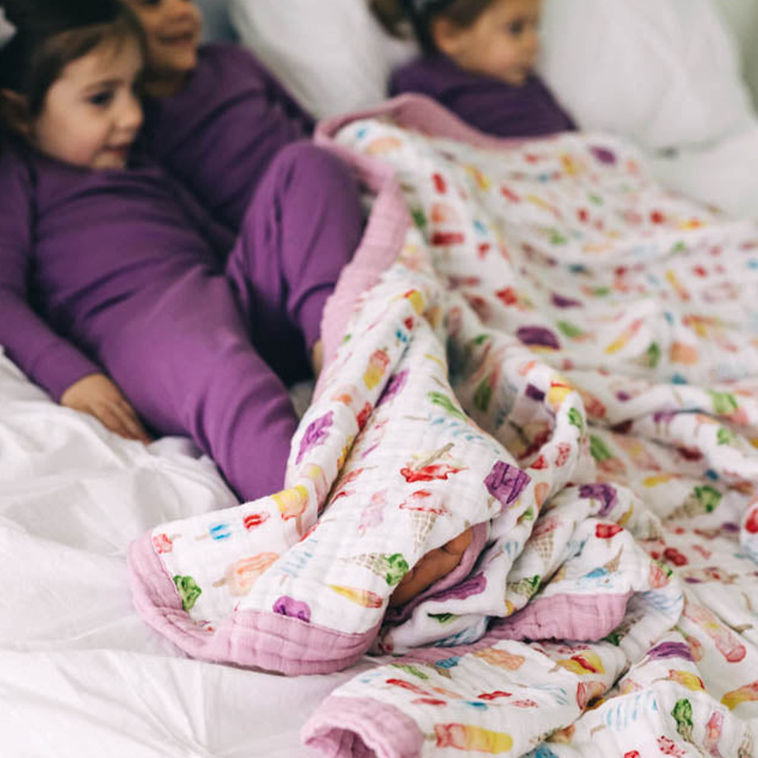 Little Unicorn premium quilt emphasizes easy-care machine washability and colorfast design