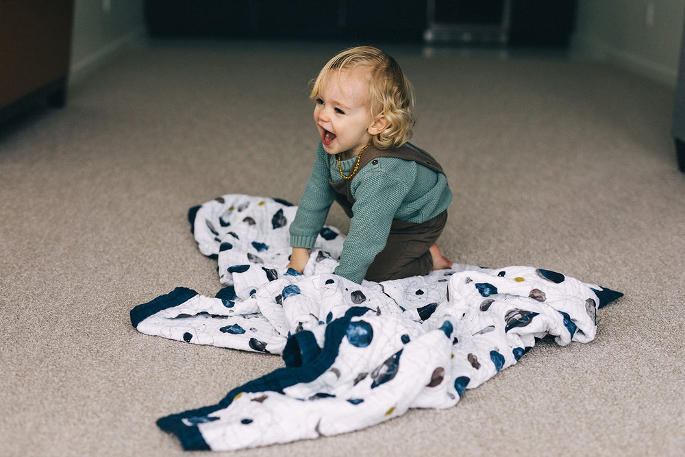 Little Unicorn Premium Quilted Throw Planetary playtime surface ideal for kids