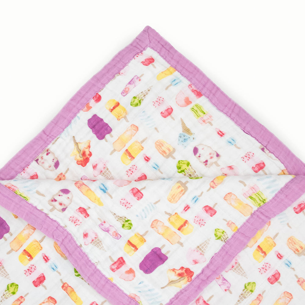 Little Unicorn premium quilt travel-friendly design ready for on-the-go snuggles