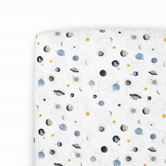Little Unicorn Premium Stretch Knit Crib Sheet with planets pattern offers soft, safe bedtime comfort.