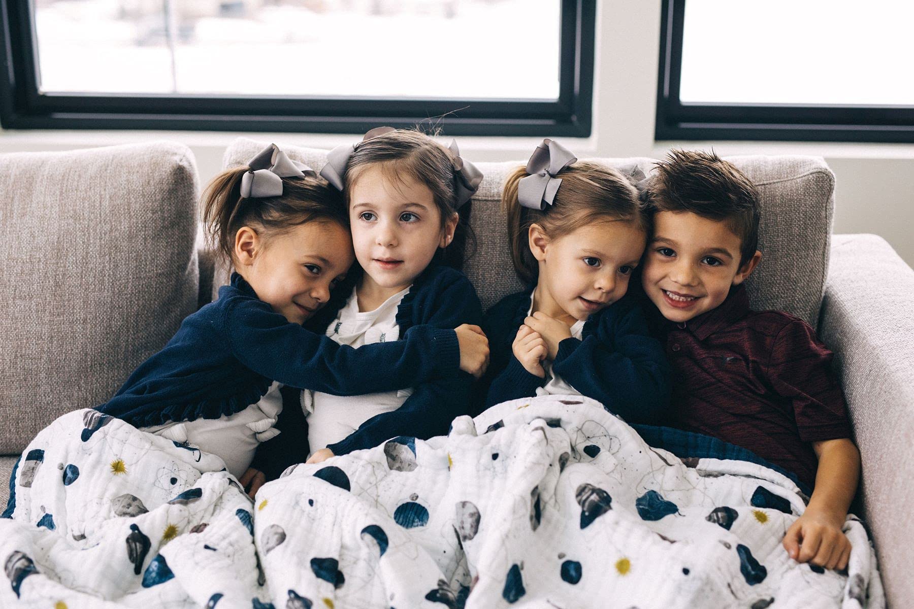 Little Unicorn Premium Quilted Throw Planetary edge stitching and reversible fabric for durability