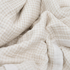 Little Unicorn quilt stitching detail highlights premium craftsmanship and breathable muslin