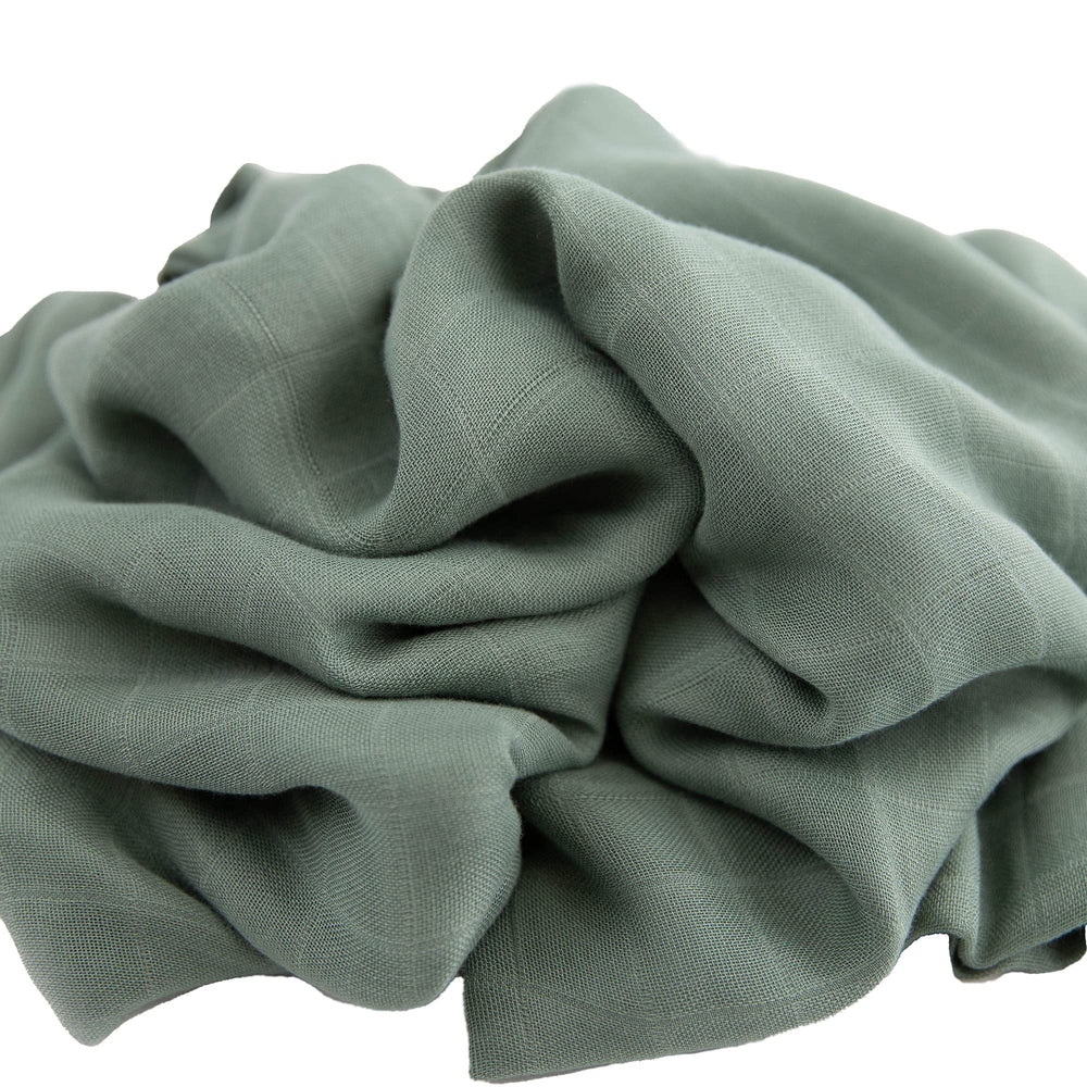 Little Unicorn Sage Deluxe Swaddle machine-washable for busy parents.