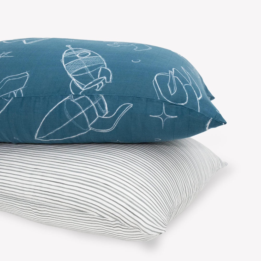 Little Unicorn standard pillowcase two-pack in soft muslin for cozy sleep.
