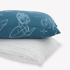 Little Unicorn standard pillowcase two-pack in soft muslin for cozy sleep.