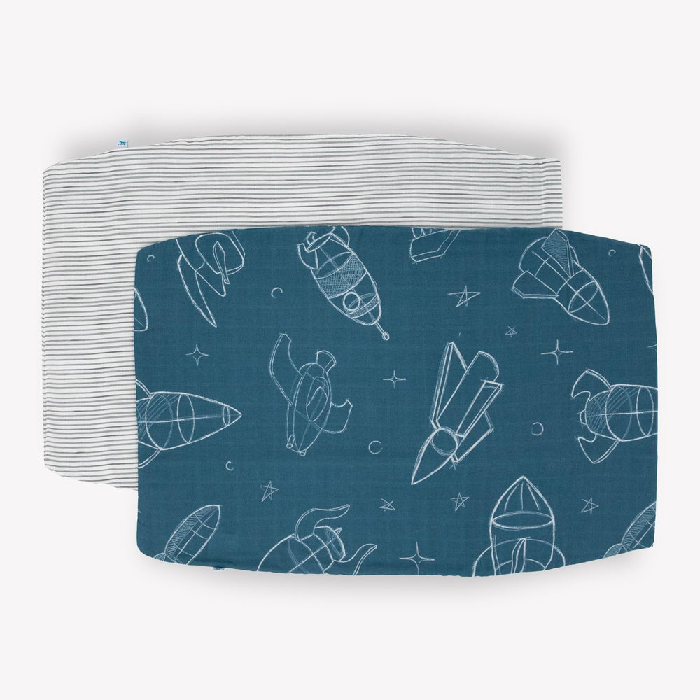 Little Unicorn envelope-closure pillowcase securing the pillow overnight.