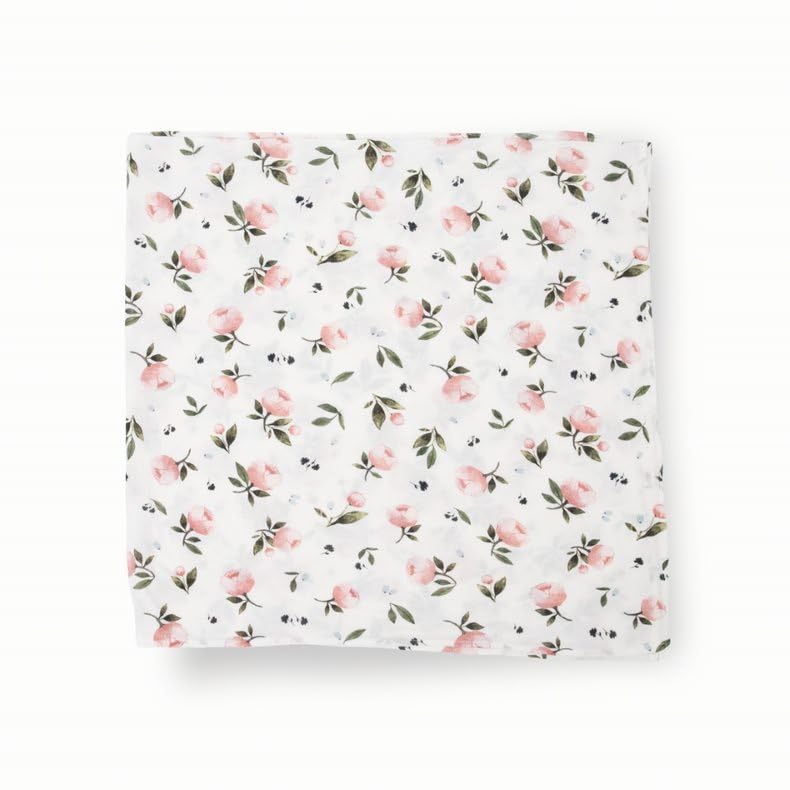 Little Unicorn Watercolor Rose swaddle close-up on fabric reveals breathable softness