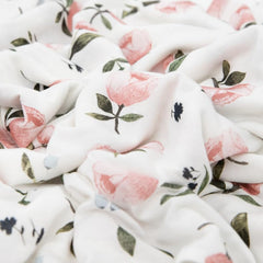 Little Unicorn Watercolor Rose swaddle folded pack emphasizes compact storage