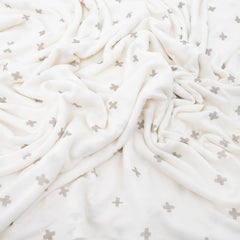 Little Unicorn swaddle blanket grey cross laid flat to show buttery-soft texture.