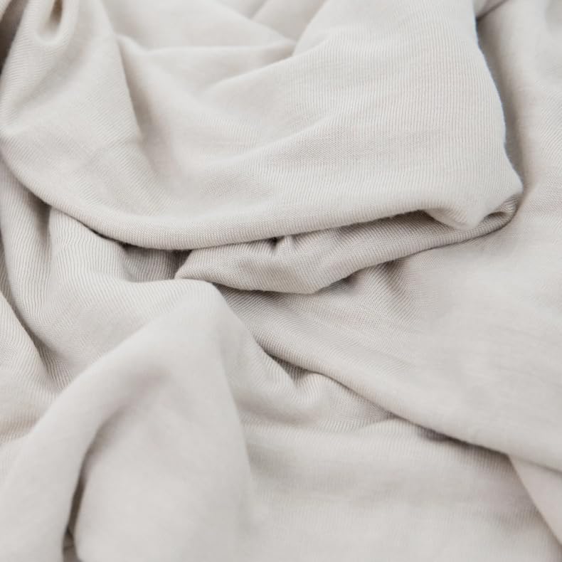 Little Unicorn swaddle blanket grey cross ready for stroller outings.