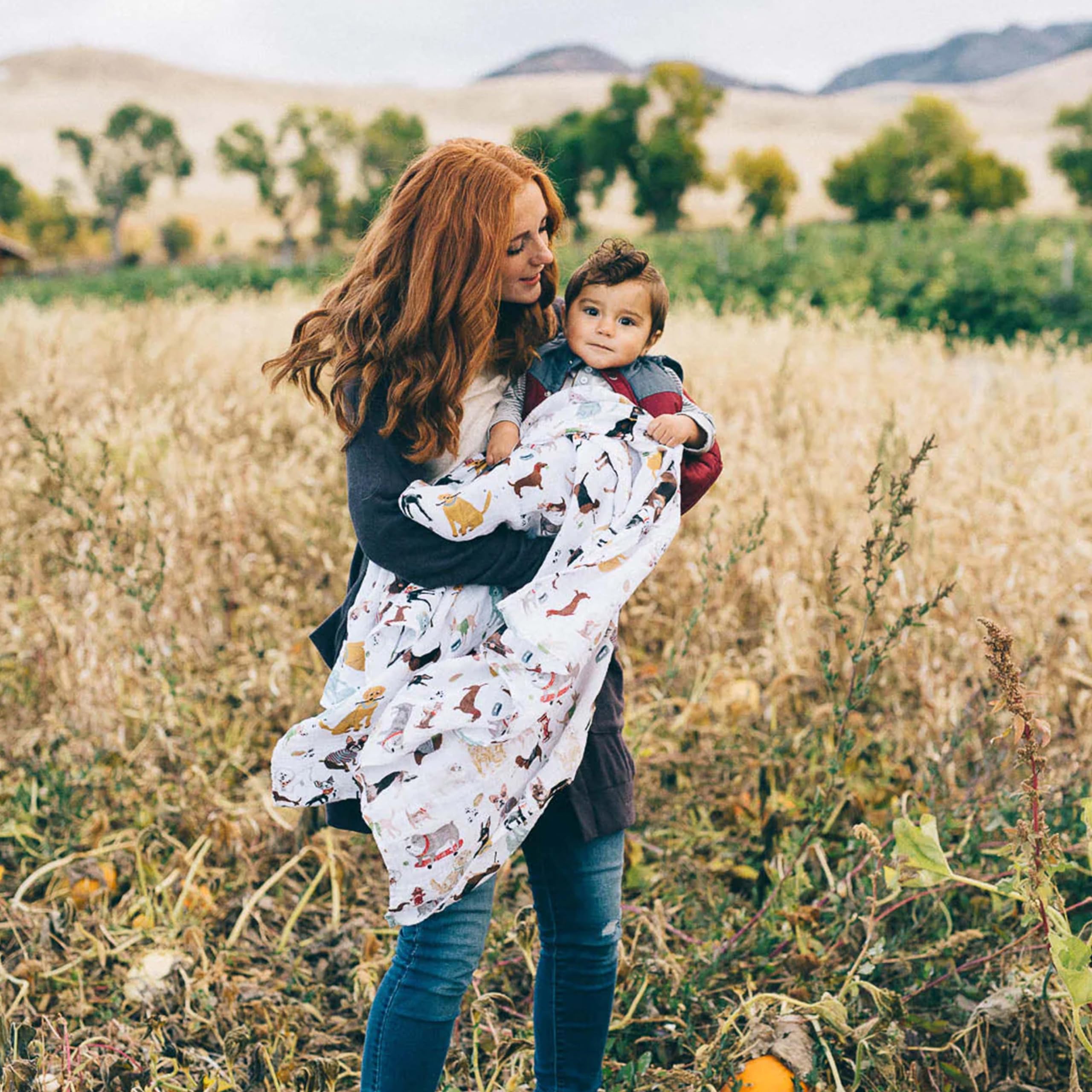 Little Unicorn swaddle blanket in crib or stroller setup for on-the-go