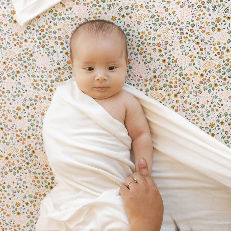 Little Unicorn swaddle car-seat wrap handy during travel and errands