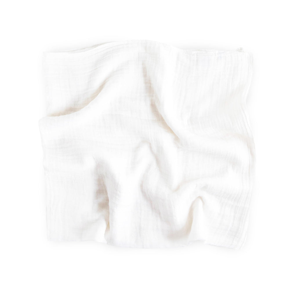 Little Unicorn swaddle featuring galaxy-check-solid design emphasizes secure wrapping for calm naps.