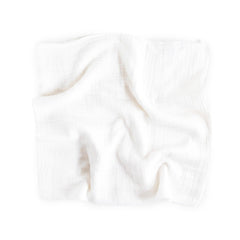 Little Unicorn swaddle featuring galaxy-check-solid design emphasizes secure wrapping for calm naps.