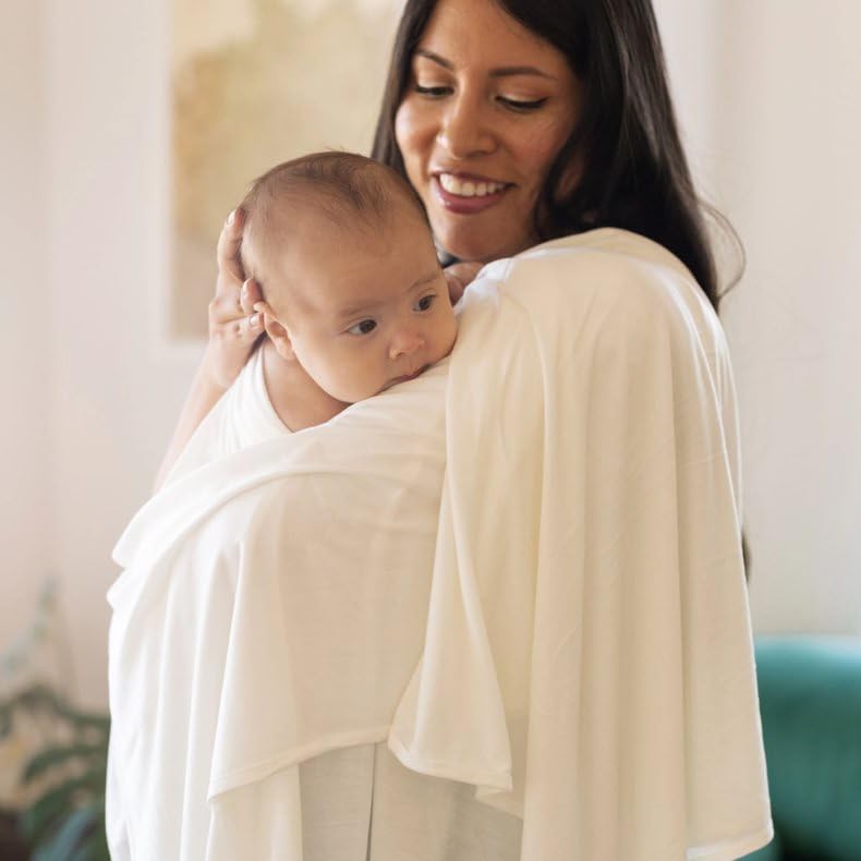 Little Unicorn swaddle easy-care image highlighting machine wash and dryer safety