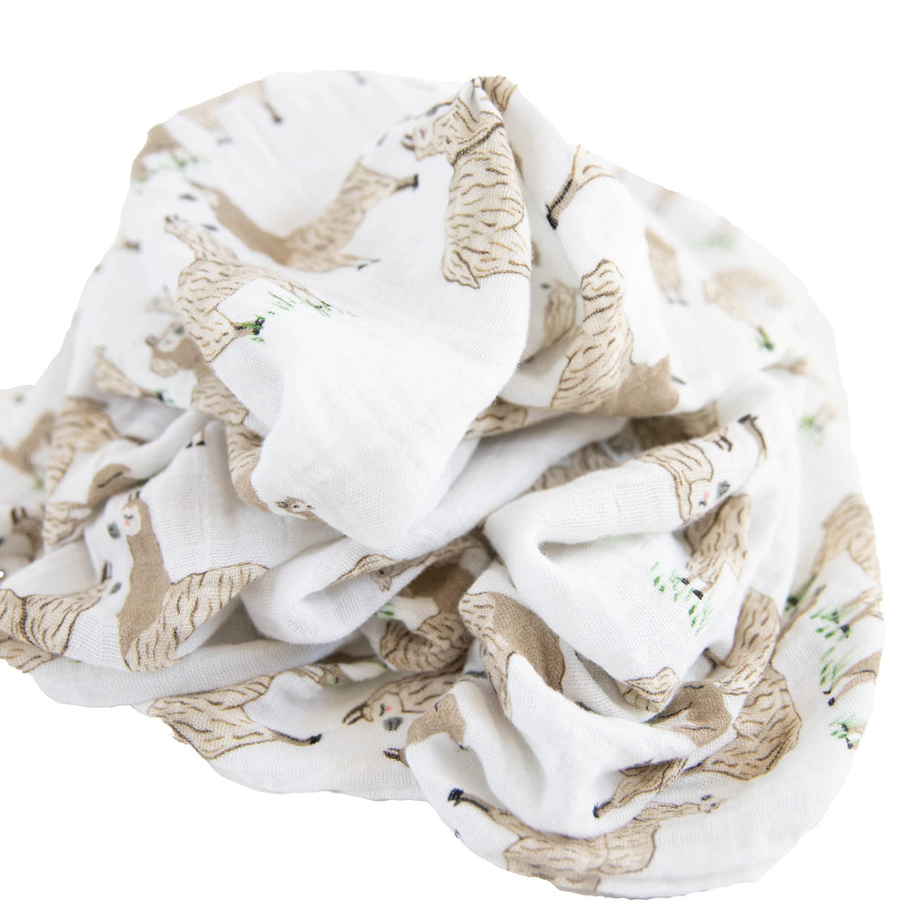 Little Unicorn swaddle fabric close-up muslin texture soft durable weave.