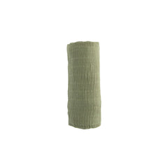 Little Unicorn swaddle Fern on baby; lightweight warmth for stroller time.