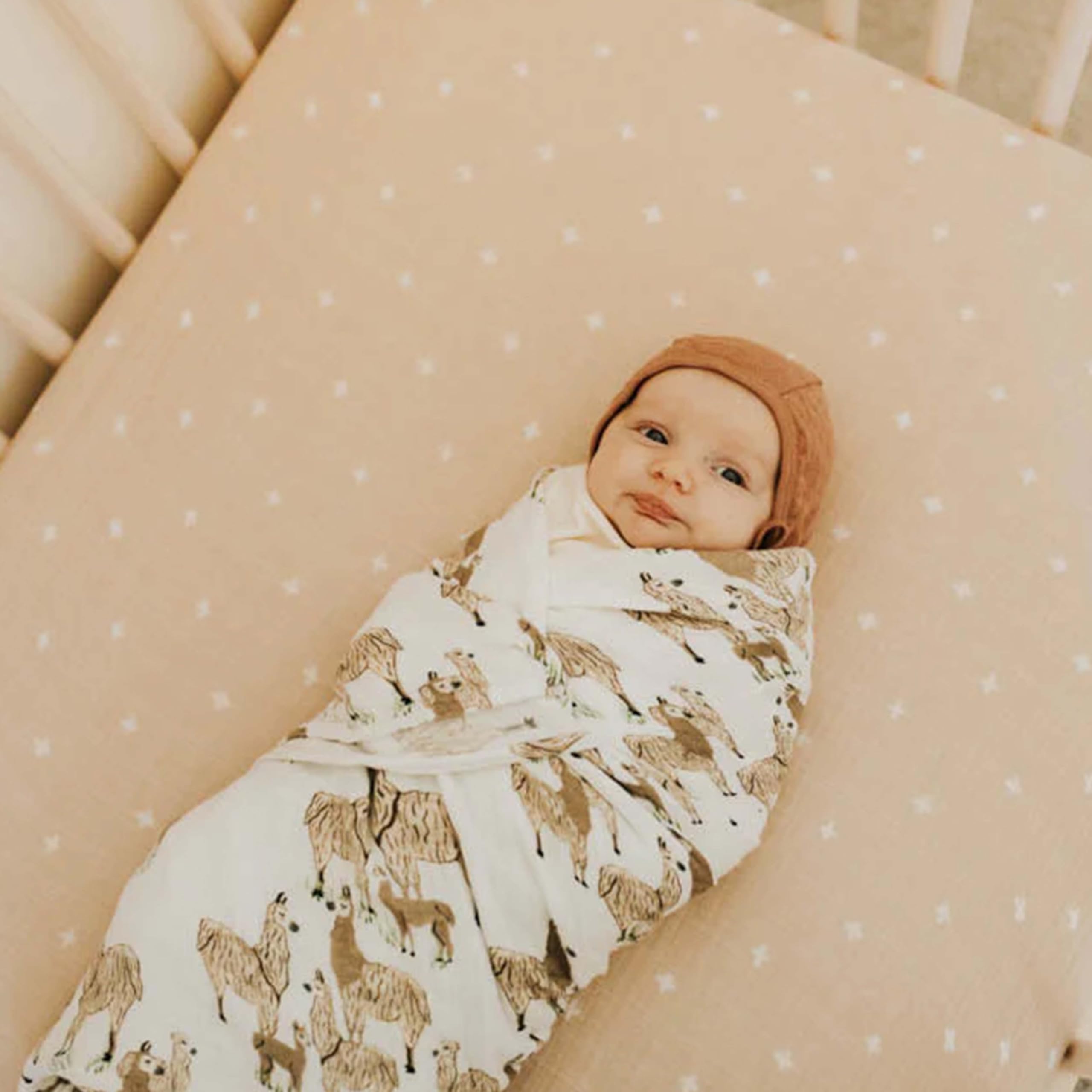 Little Unicorn colorfast patterns complement nursery decor.