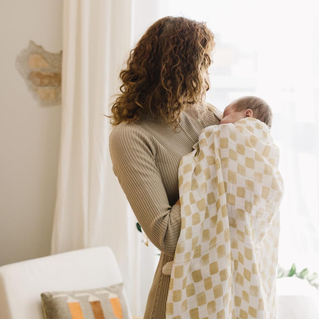 Little Unicorn swaddle travel compact design shows easy packing for outings.