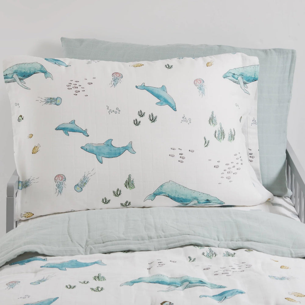Little Unicorn pillowcase whales breathable-muslin shows airy fabric for warm nights.